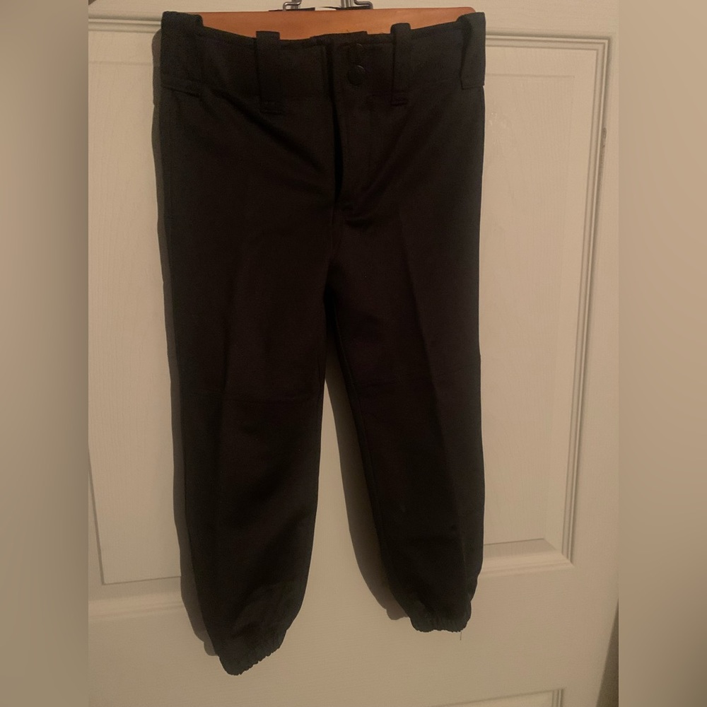 Child youth size medium girls softball pants. Band new never worn